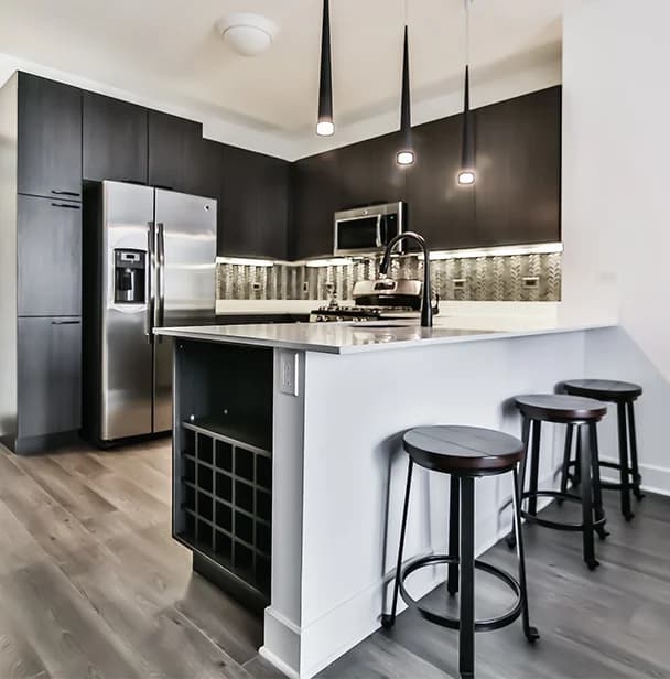 Stylish apartment kitchen with modern appliances